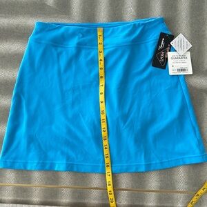 Athleta Sweet Sport Skort sz M in turquoise blue.